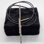 Collier flute - Cuir tressé