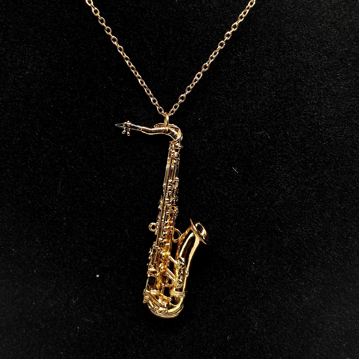 oplus_8592097328 Colier Saxophone - chaine or – Image 1